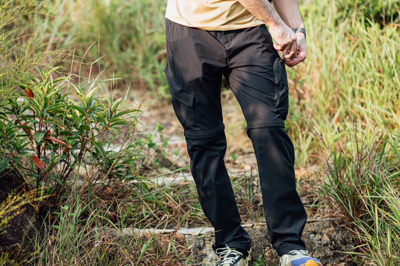 Walking through tall grass in All Rounder Adventure.
